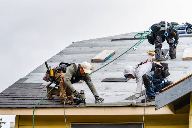 Professional Gutter Installation technician working in Augusta, KS